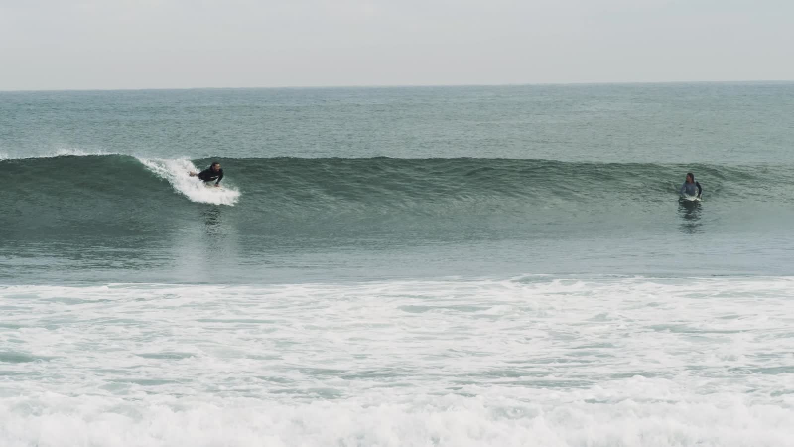 Surfer riding an ocean wave